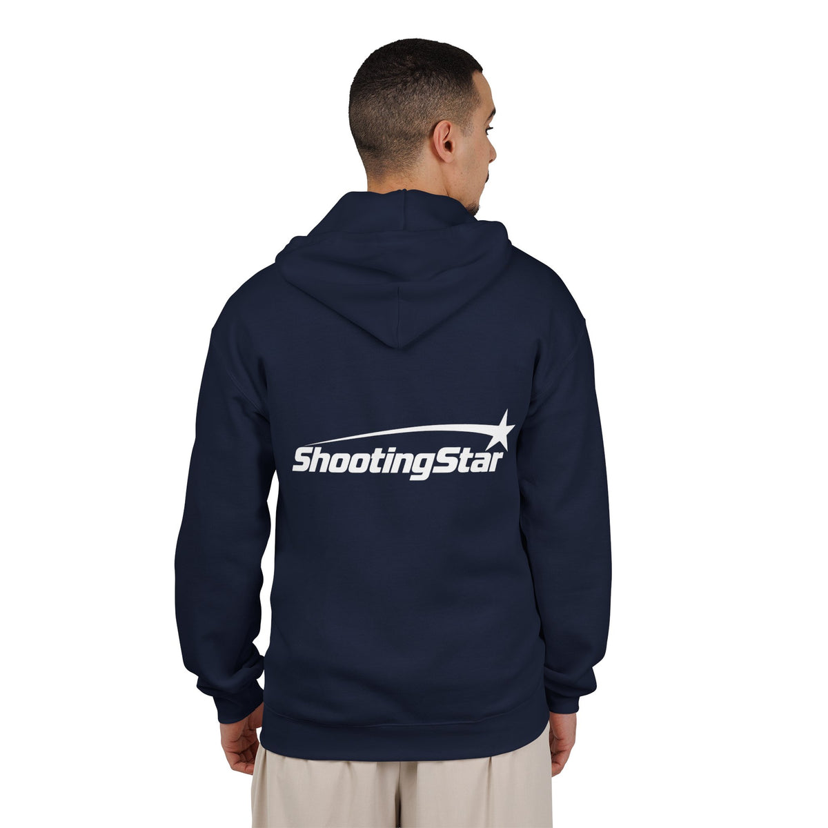 Back view of a person wearing a navy blue fabric hoodie featuring a white Shooting Star graphic printed on the back.